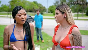 Interracial bikini friends share in group activity