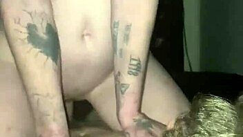 Redhead sucks and fucks hard in homemade tattoo scene!