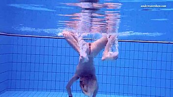 Teen Russian girl swims and masturbates in a hot shower