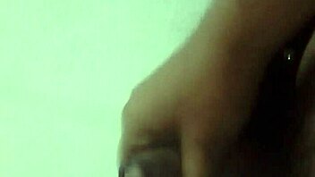 this babe is masturbating live on cam, fingers deep in her wet pussy