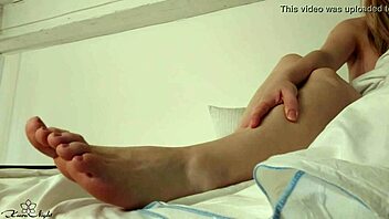 blonde babe oils legs for sensual amateur massage session