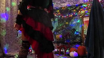 a redhead milf wife dances in halloween costume, showing her pussy in this homemade alt version