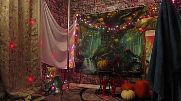 a redhead milf wife dances in halloween costume, showing her pussy in this homemade alt version