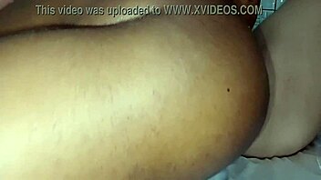 Young woman receives attention and feels intense pleasure