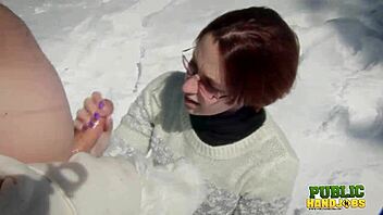 Outdoor handjob by Brandi De Lafey with a snowman