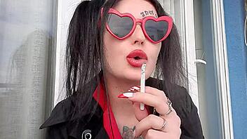 Dominatrix Nika's smoking fetish in action