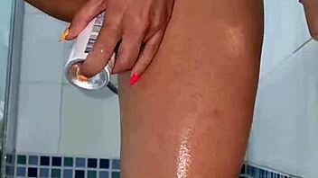 shaved babe teases with deodorant bottle play after steamy shower