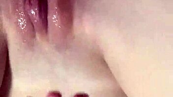 Is this goth girl teasing you with her strip tease in fishnets?