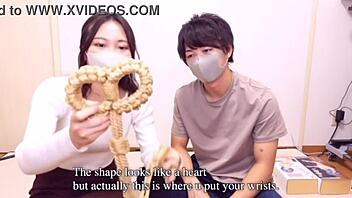 Wow, this Japanese babe is tied up in ropes, getting fingered to extreme orgasm with collar and gag! 😍