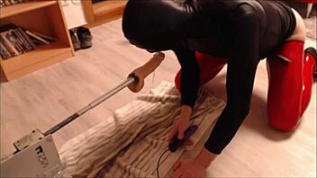 latex-clad shemale ballerina gets throat and ass fucked by machine while masked as slave