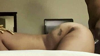 Ebony couple takes monster cock in ass doggystyle hard.