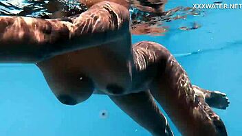 Yorgelis's seductive performance in wet and wild scene