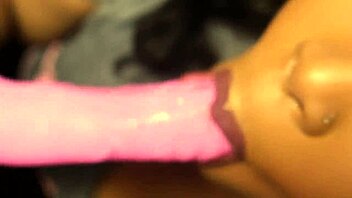 latina milf masturbates with dildo on bed