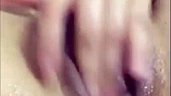 The ebony woman masturbates her fat pussy until she cums