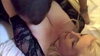 Blonde milf licks big cock before getting bent over and fucked doggystyle.