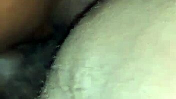 Oiled ebony beauty takes a hard cock. Her ass shakes with every deep thrust.