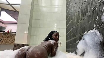Sensual shower with a big-butt babe in fishnet