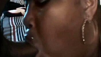 plump ebony woman performs oral in homemade setting