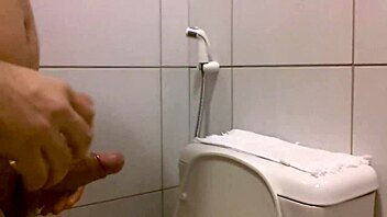 Watch this oiled handjob end in cumshot.