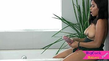 Watch this beautiful ebony shemale stroke her big cock in this fantasy video