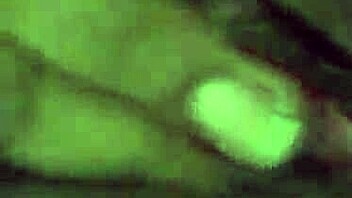 a european woman uses a blue dildo for masturbation in her german home