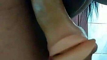 Wife Masturbating in the Bathroom with Dildo