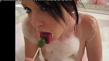 Tiny Red Slut Teases In Bathtub