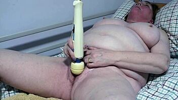 Mature woman with big tits masturbates loudly in front of you