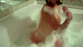 Tiny Red Slut Teases In Bathtub