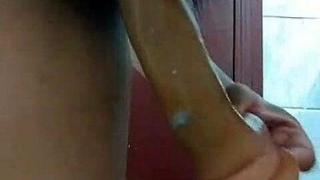 Wife Masturbating in the Bathroom with Dildo