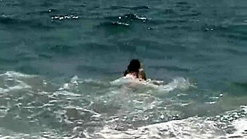 American teen April strips down to her bikini for a solo masturbation session
