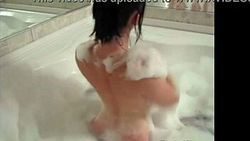 Tiny Red Slut Teases In Bathtub