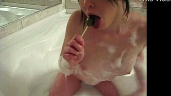 Tiny Red Slut Teases In Bathtub