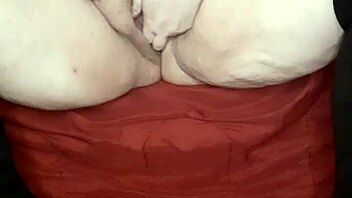 Fucking my wet pussy in stiletto boots, soaking my blanket with cum while I moan.