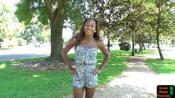 Just chilling with a stockinged ebony shemale stroking herself.