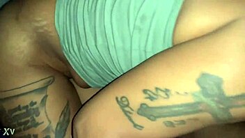 Black babe with big tits and tattoos sucks a big black dick