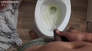Chalatan shows the proper way to use a toilet in bathroom.