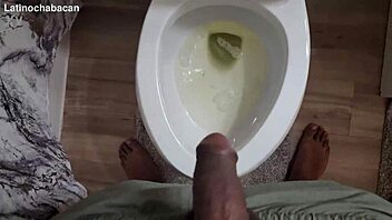 Chalatan shows the proper way to use a toilet in bathroom.