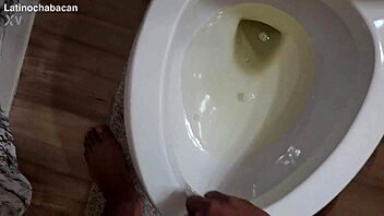 Chalatan shows the proper way to use a toilet in bathroom.