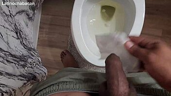 Chalatan shows the proper way to use a toilet in bathroom.