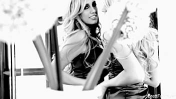 Brett Rossi plays with her shaved pussy