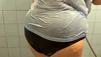 chubby mature granny enjoys a steamy shower moment.