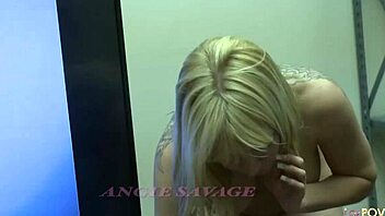 Tattooed Lesbian Twirls Dildo in Wet Cunt