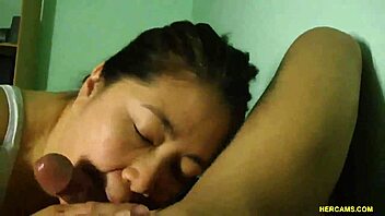 amateur asian girl teases with webcam blowjob