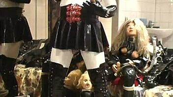 Ebony Babe Poses in Black Rubber Outfit