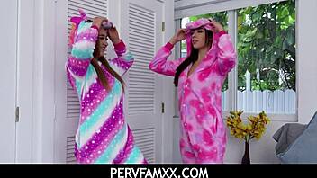 Horny stepsisters Callie Black and Gaby Ortega make out in bed.