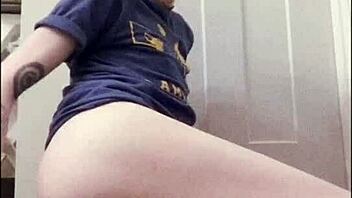 Cute shaved twink uses dildo on floor