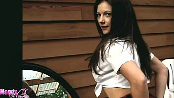 A Brunette bombshell teases and strips outdoors in high definition