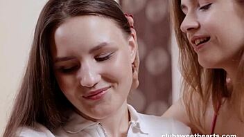 Two cute girls explore each other's bodies in a steamy lesbian session
