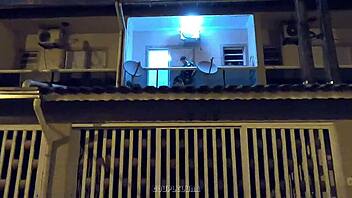 Amateur teen caught having sex in public on a balcony